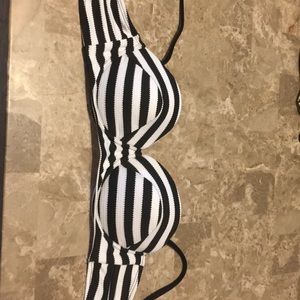 Striped swim suit top that has adorable back